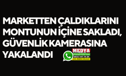 Marketten çaldıklarını montunun içine sakladı, güvenlik kamerasına yakalandı