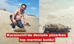 Karaincirli’de denizde yüzerken top mermisi buldu!