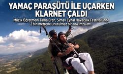 Yamaç paraşütü ile uçarken klarnet çaldı