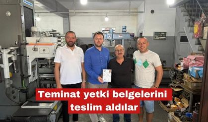 Teminat yetki belgelerini teslim aldılar
